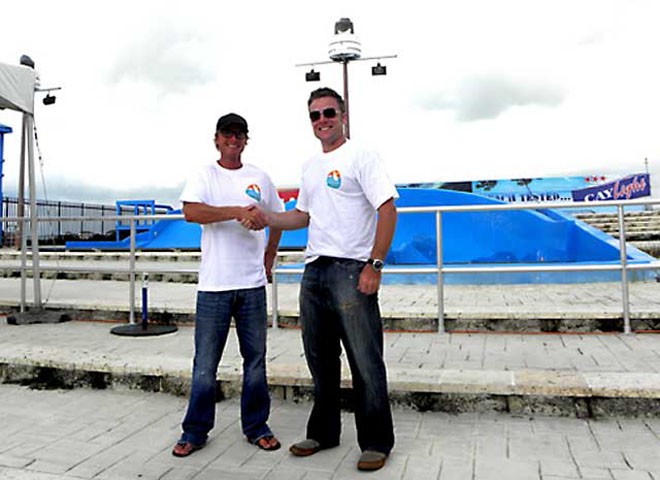 Mike Weber, CISC Sailing Director with John Mack of Brickhouse Restaurant and Black Pearl Skate Park in front of the wave machine. The Brickhouse and Black Pearl are hosting the competitors to dinner on Sunday night, the 14th, where they will also be able to use the wave machine! © Byte Class http://bytechamps.org/